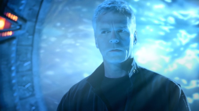 Col. Jack O'Neill standing before an active gate in "Stargate: SG-1" (1997-2007)