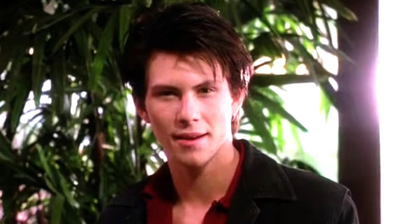 J.D. wearing a black jacket