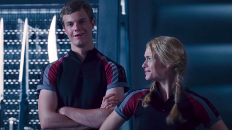 Marvel smiling in The Hunger Games