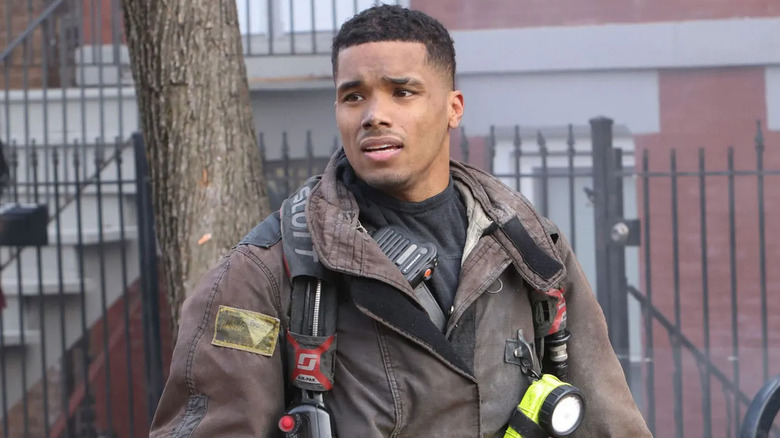 Derrick Gibson standing in the street in uniform in Chicago Fire