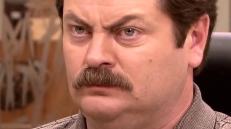 Close-up of Ron Swanson frowning