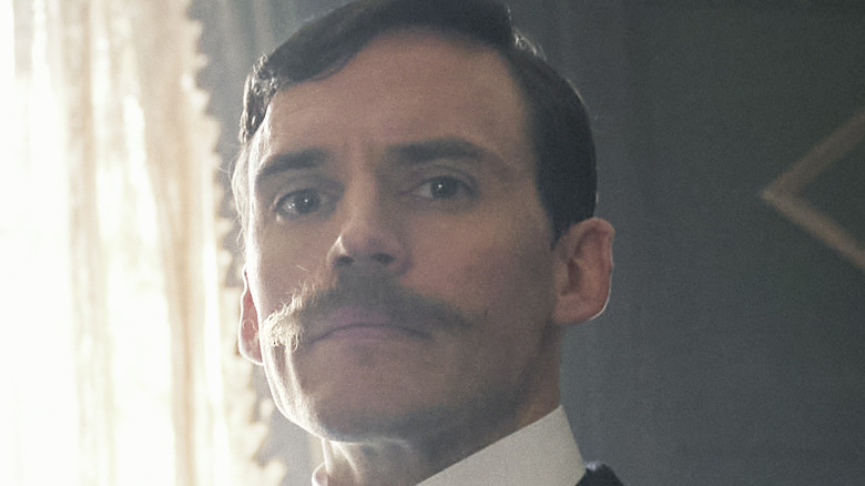 Mycroft Holmes looking cross