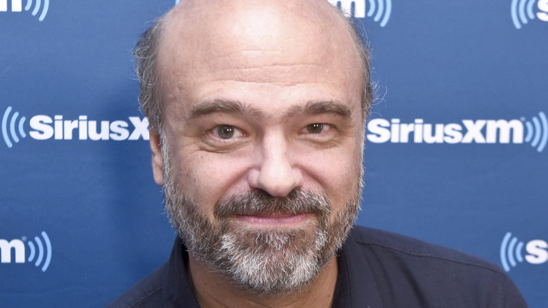 Scott Adsit smiling for press