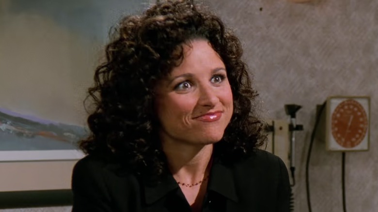 Elaine strained smile