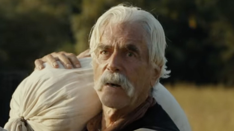 Sam Elliott carrying sack in 1883