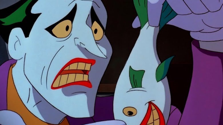 Joker holding a clown fish