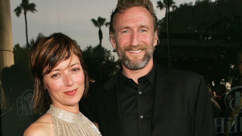 Mia Sara and Brian Henson posing together