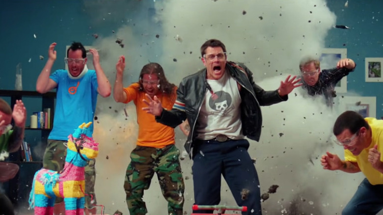 Jackass cast in front of an explosion