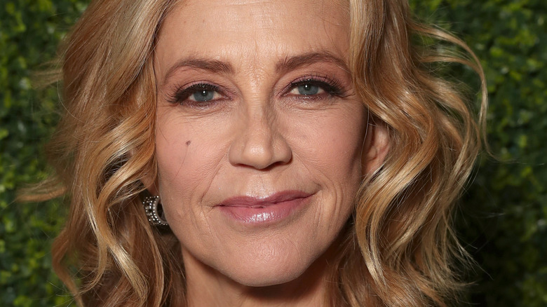 Ally Walker smiling