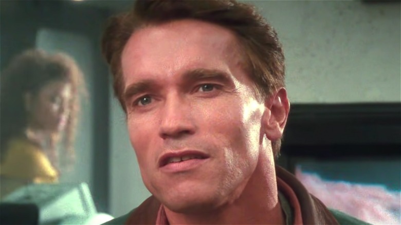 Arnold Schwarzenegger smirking