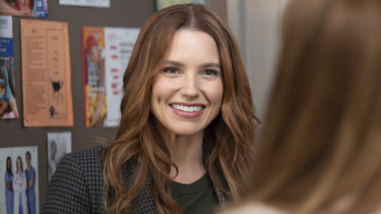 Dr. Cass Beckman smiling in "Grey's Anatomy"