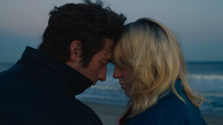 Bruce Springsteen and Faye Romano share a tender moment at the beach in "Springsteen: Deliver Me From Nowhere" (2025)