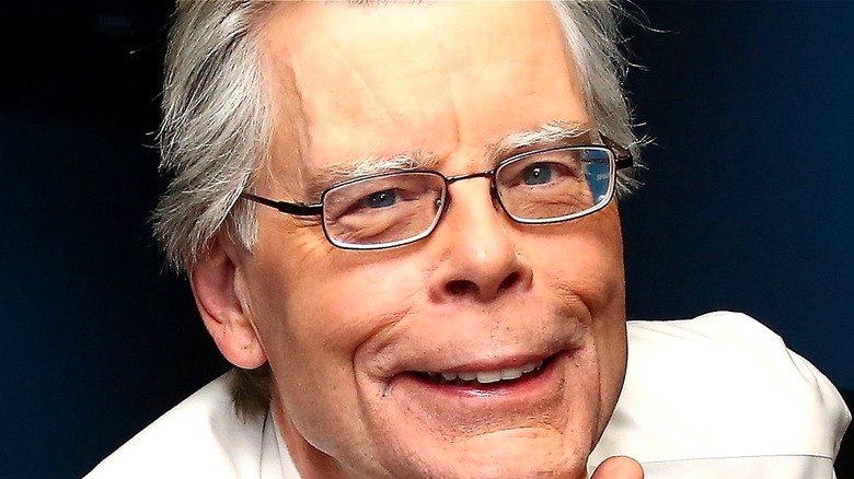Stephen King posing for a photo