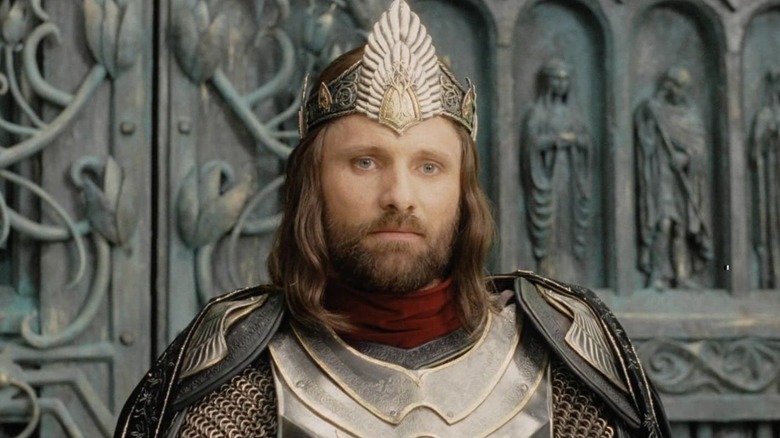 Aragorn crowned sitting on his throne in "The Return of the King"
