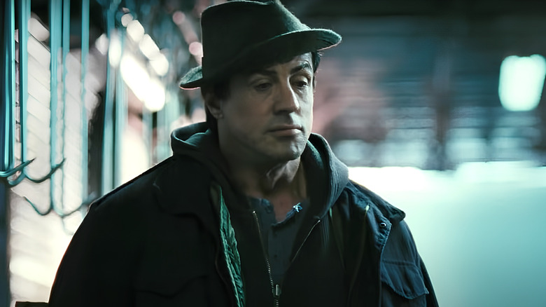 Rocky looks down mournfully