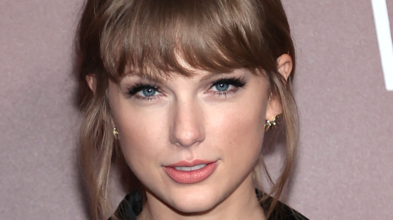 Taylor Swift smiles coyly