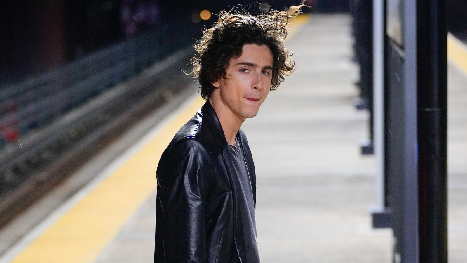 Timothée Chalamet Films Chanel Commercial in Leather Suit in NYC