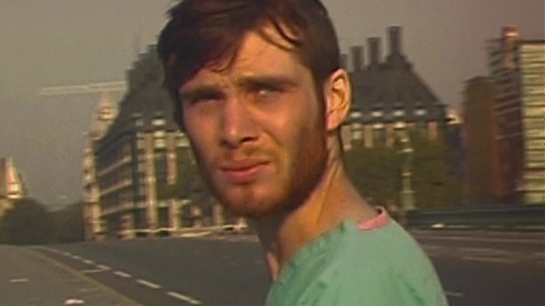 Jim walking down empty street