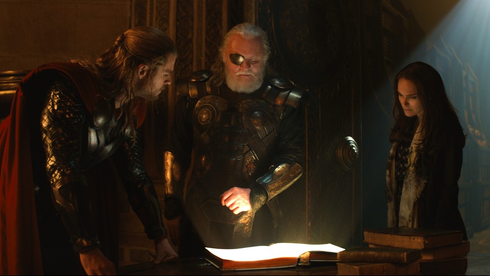 Chris Hemsworth, Anthony Hopkins, and Natalie Portman in Thor: The Dark World