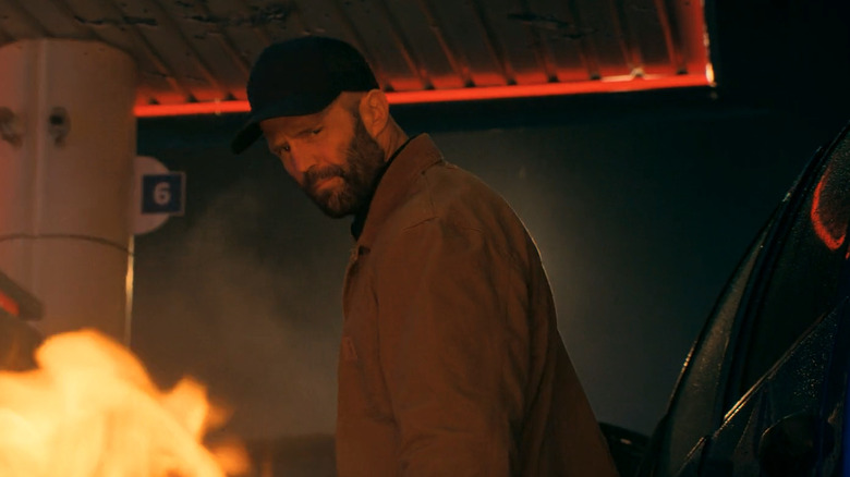 Clay turns in front of fire