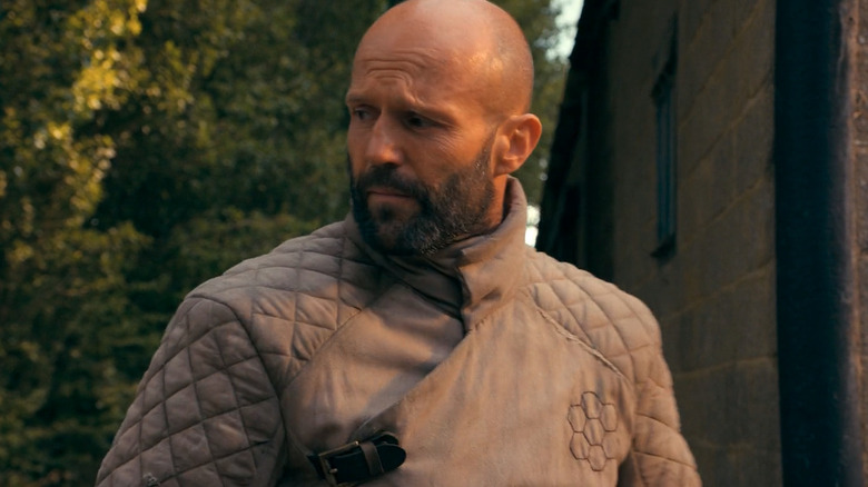 Clay looks over his shoulder