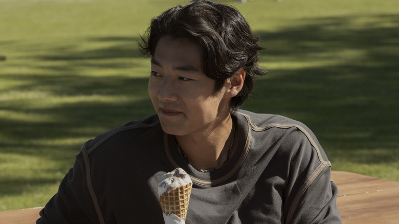 Jordie smiling and holding an ice cream cone on Every Year After