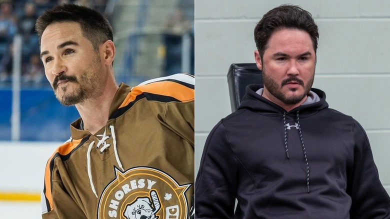 Ryan McDonell smiling in a hockey jersey and Michaels frowning while sitting on a piece of workout equipment in "Shoresy."