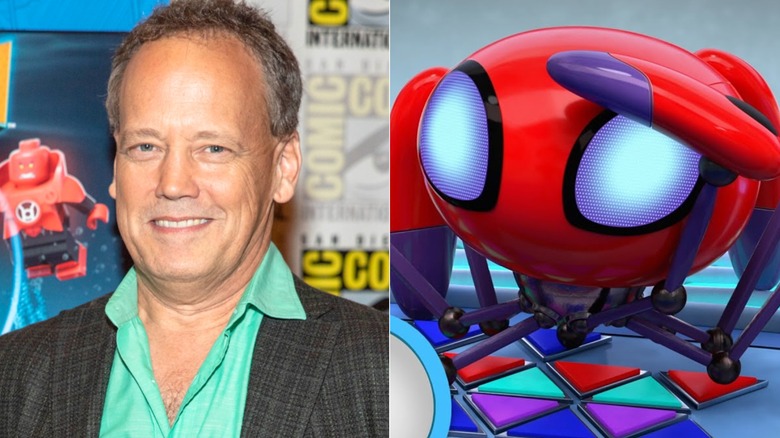 Dee Bradley Baker smiles at Comic-Con 2018; TRACE-E salutes