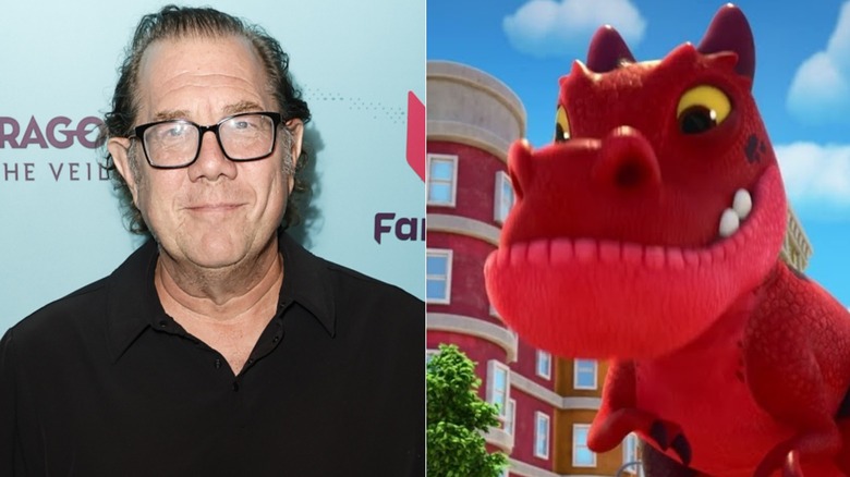 Fred Tatasciore poses at Fandom's Seventh Annual Party at Float in 2024; Devil Dinosaur smiles against a cityscape
