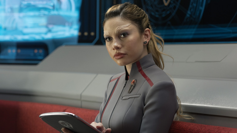 Genesis Lythe using a computer pad in Star Trek: Starfleet Academy