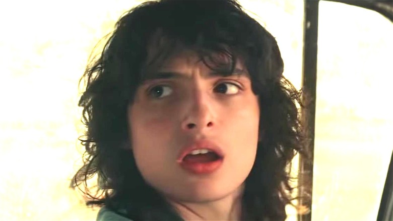 Finn Wolfhard looks concerned in Ghostbusters Afterlife