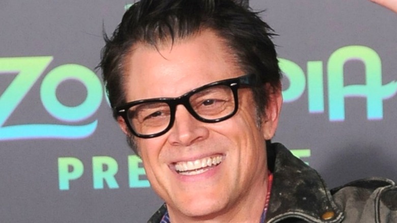 Johnny knoxville with glasses on smiling 