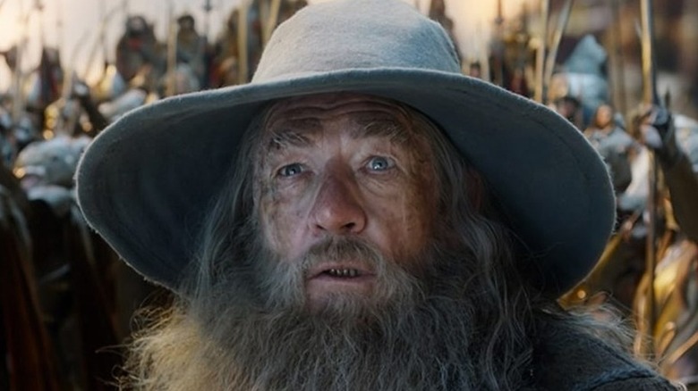 Gandalf looks up in shock