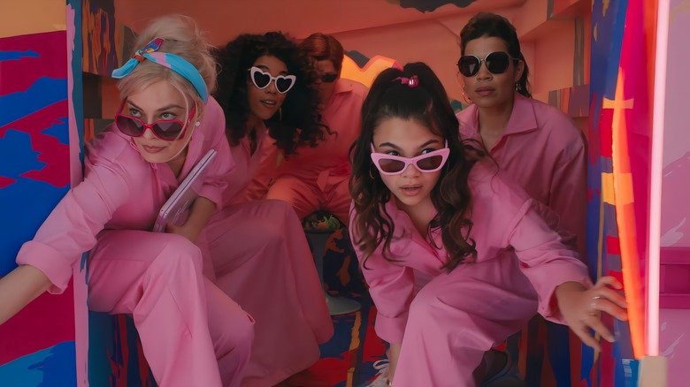 Barbie, Barbie, Gloria, and Sasha wearing sunglasses