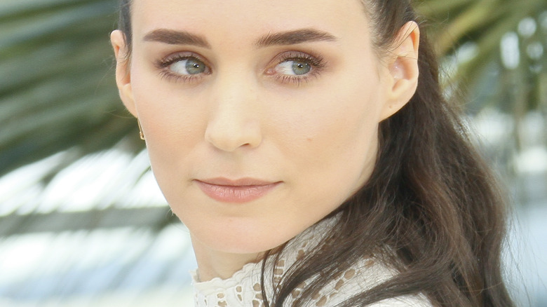 Rooney Mara looks over shoulder