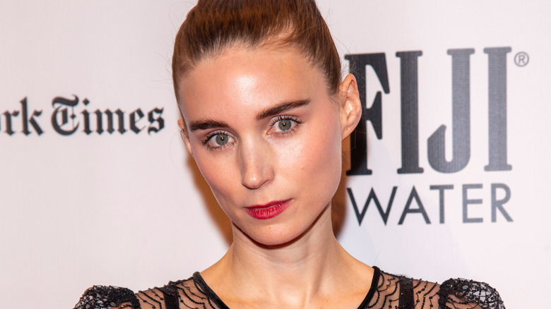 Rooney Mara looks forward in red lipstick