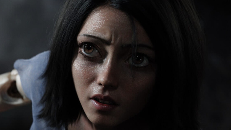 Alita sweating in a blue shirt