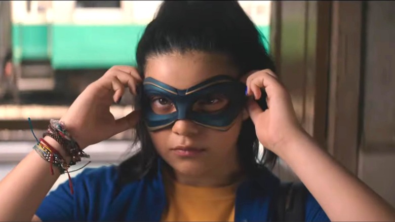Kamala Khan donning a mask in Ms. Marvel