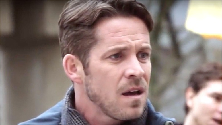 Sean Maguire as Robin Hood winces