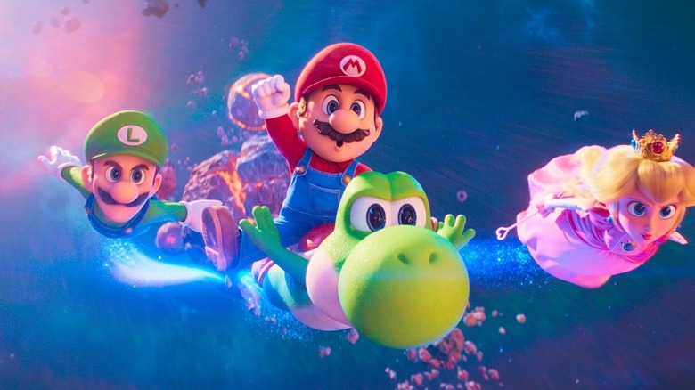 Luigi, Mario, Yoshi, and Princess Peach flying in space in The Super Mario Bros Galaxy Movie