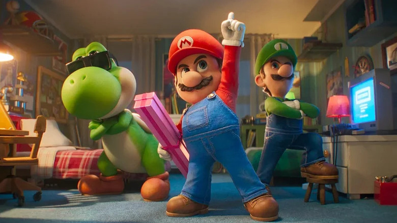 Yoshi, Mario, and Luigi making a heroic pose in The Super Mario Bros Galaxy