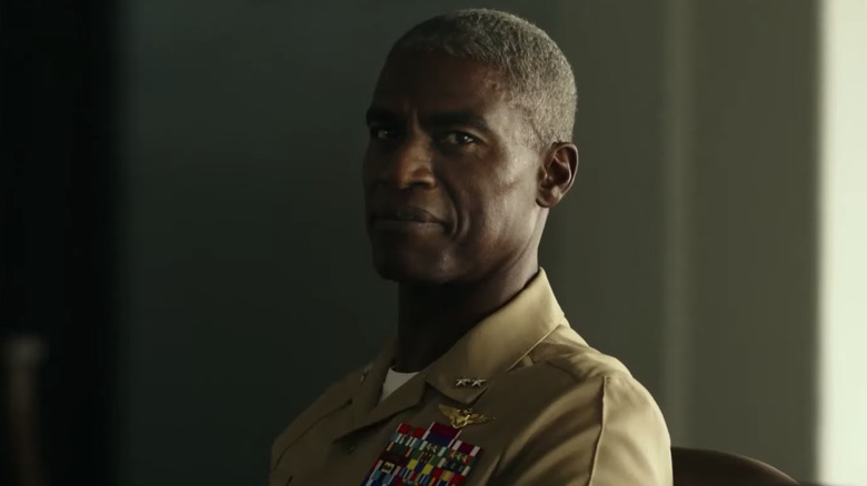 Warlock smiling at Maverick