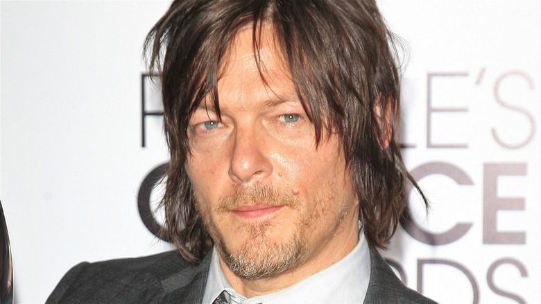 Norman Reedus smirking