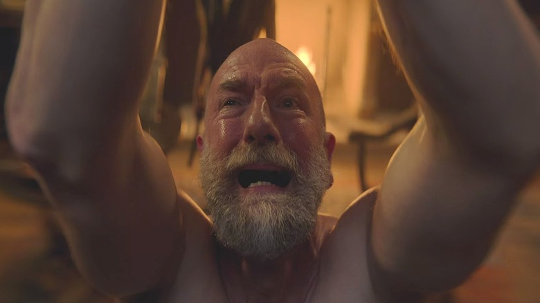 Dijkstra screaming with arms raised