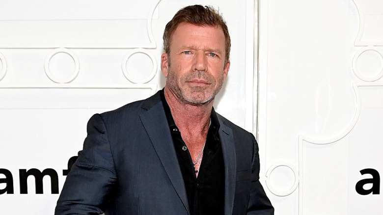 Taylor Sheridan on the AMFAR red carpet in 2026