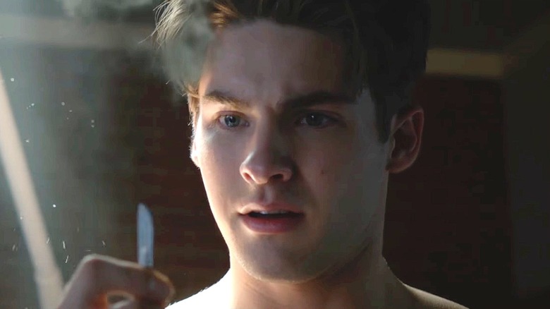 Theo Raeken holding a scalpel