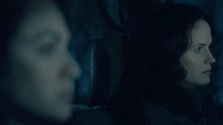 Theo and Lulu are shocked by the ghost of their sister interrupting their argument