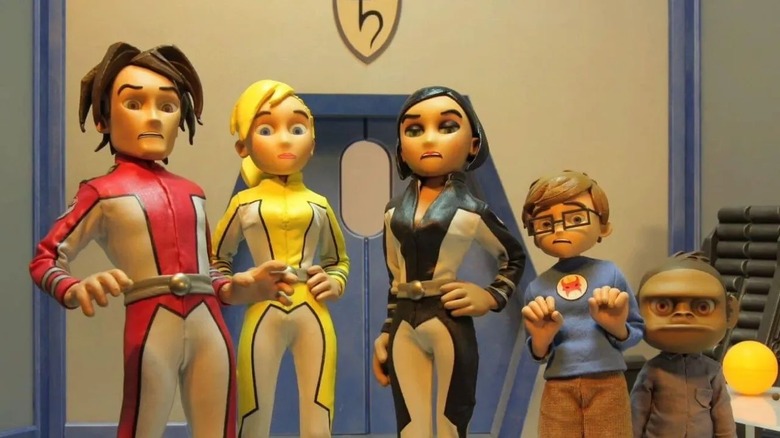Titan Force Five, led by Captain Palmer, pose bravely on Titan Maximum (2009)