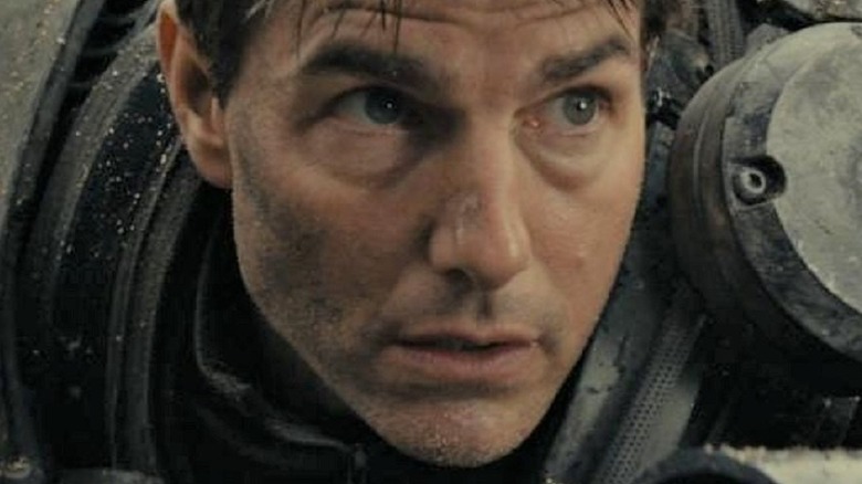 Tom Cruise on a futuristic battlefield