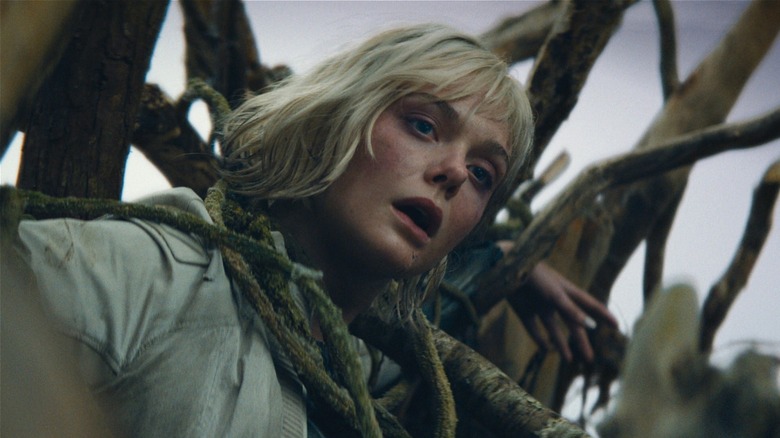 Thia tangled up in branches in Predator: Badlands